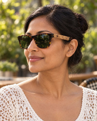 Buena Vista polarized sunglasses worn by a woman at an outdoor cafe terrace in San Francisco
