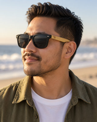 Imperial Beach polarized sunglasses worn by a man on the sand at Imperial Beach