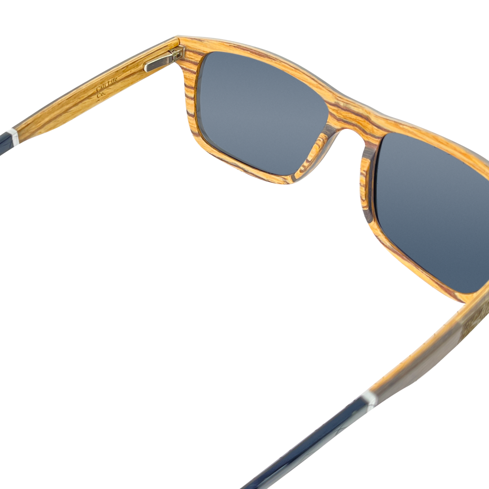 Joshua Tree polarized UV400 sunglasses close-up of stainless spring hinge and temple craftsmanship, Cali Life Co